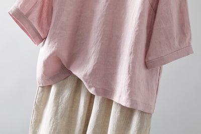 Eye-catching, cute linen blouse with a ruffled collar. Can be worn front or back. 2-way blouse. Product code: 230609