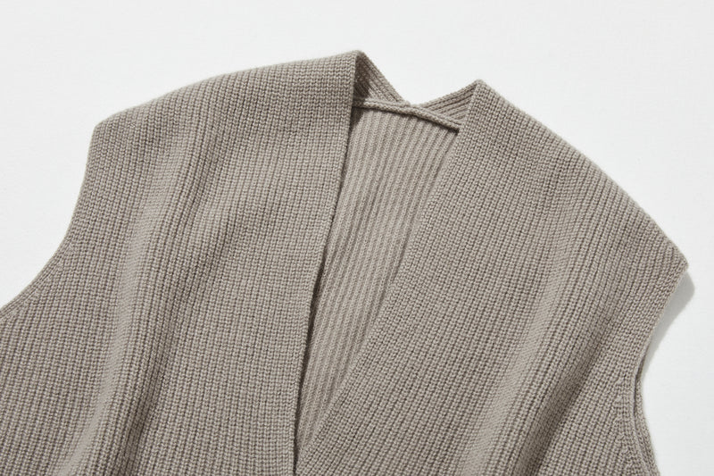 Enjoy warmth and style at home or outside with this 100% knit vest (251103-1)