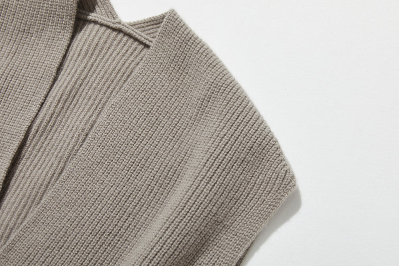 Enjoy warmth and style at home or outside with this 100% knit vest (251103-1)