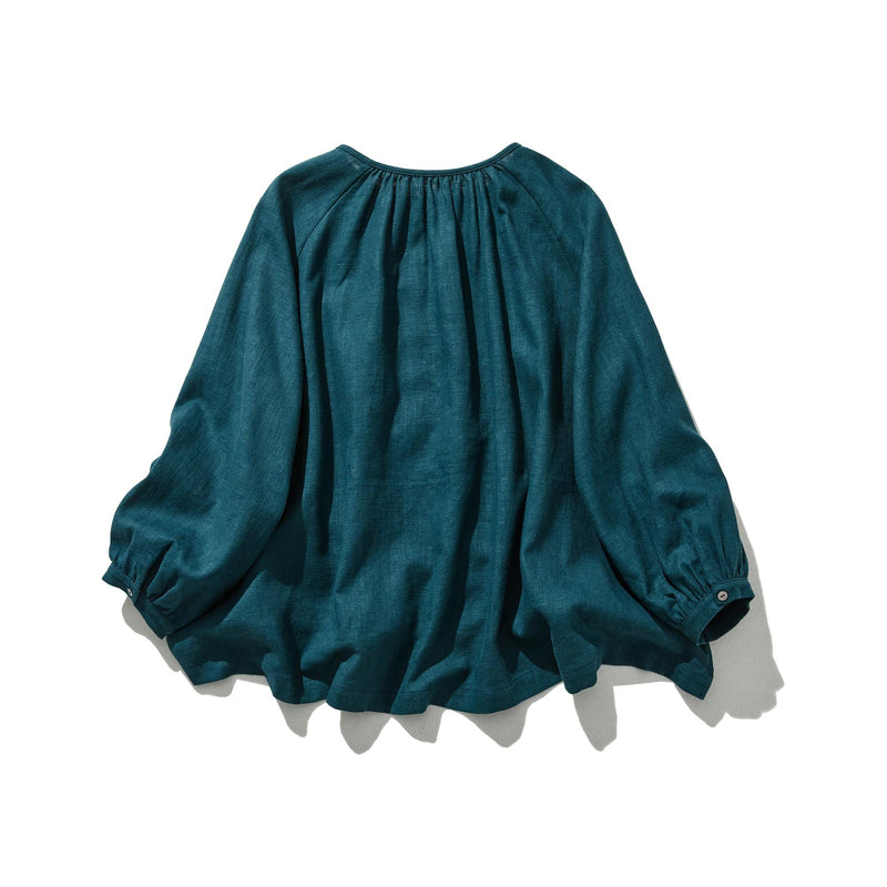 A cotton linen blouse with a captivating natural texture 240312