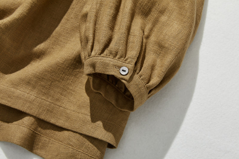 A cotton linen blouse with a captivating natural texture 240312