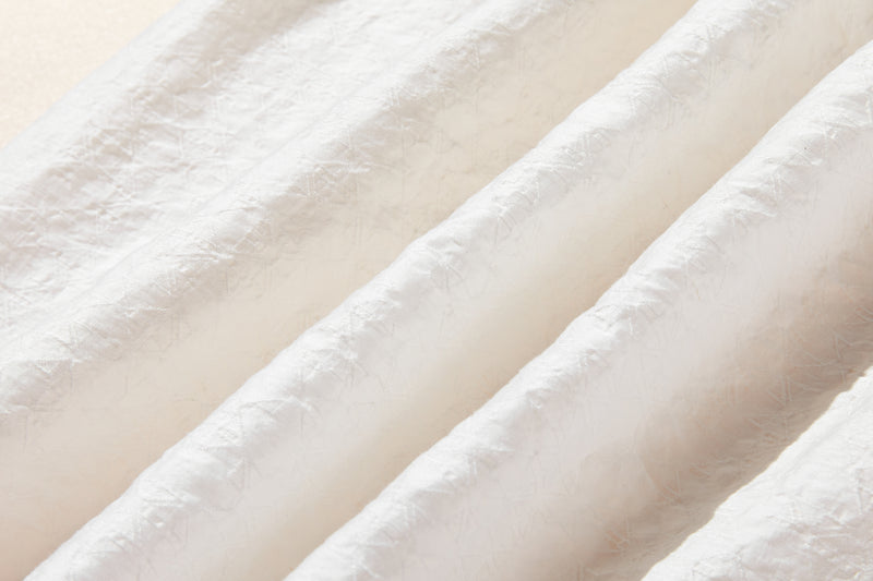 ナチュラルな涼感が魅力の7分袖ブラウス 幾何学ジャガードブラウス　 250505