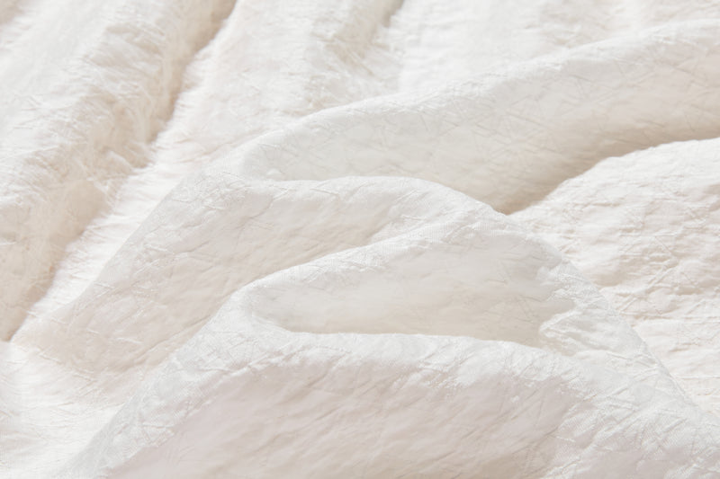 ナチュラルな涼感が魅力の7分袖ブラウス 幾何学ジャガードブラウス　 250505