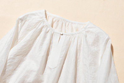 ナチュラルな涼感が魅力の7分袖ブラウス 幾何学ジャガードブラウス　 250505