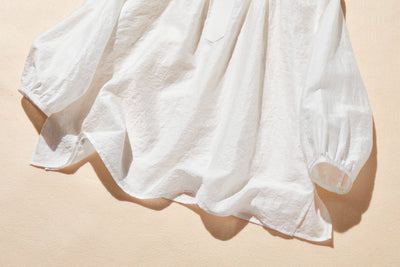 ナチュラルな涼感が魅力の7分袖ブラウス 幾何学ジャガードブラウス　 250505