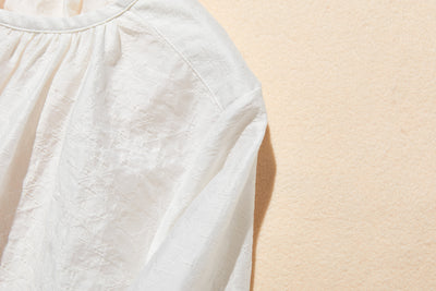 ナチュラルな涼感が魅力の7分袖ブラウス 幾何学ジャガードブラウス　 250505