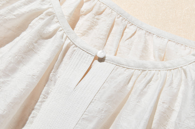 ナチュラルな涼感が魅力の7分袖ブラウス 幾何学ジャガードブラウス　 250505