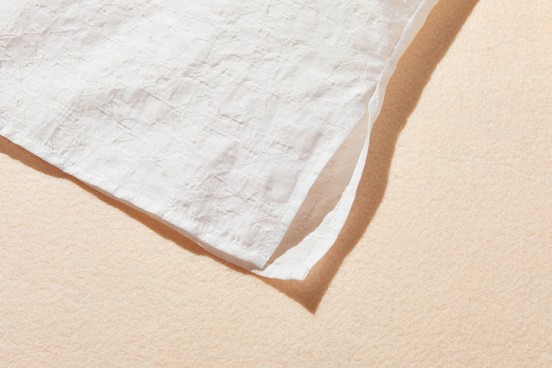 ナチュラルな涼感が魅力の7分袖ブラウス 幾何学ジャガードブラウス　 250505