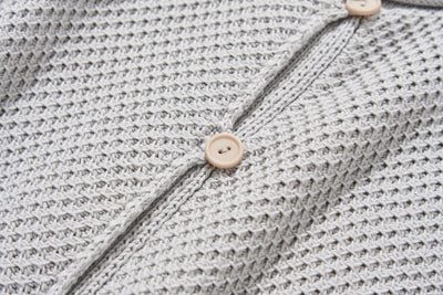 寬鬆的珠地網眼針織開襟衫，可隨意穿著 250203