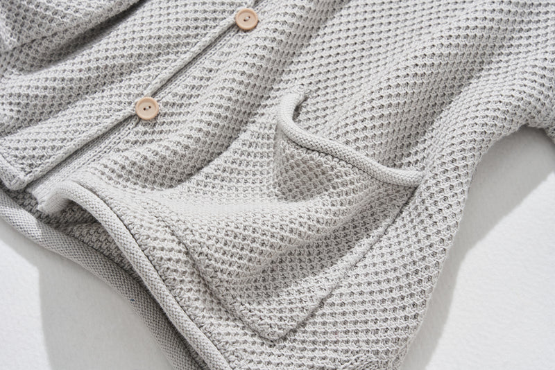 寬鬆的珠地網眼針織開襟衫，可隨意穿著 250203