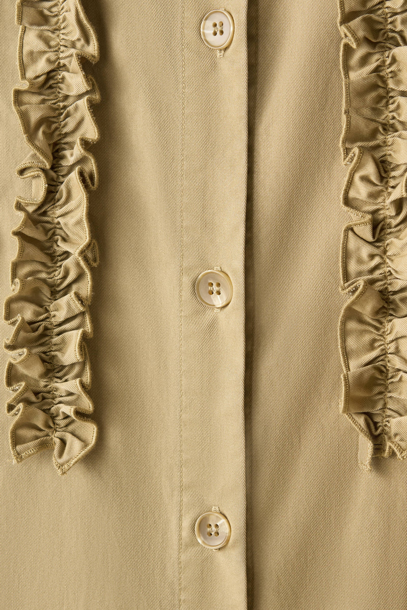 一款能滿足您時尚品味的荷葉邊設計外套。