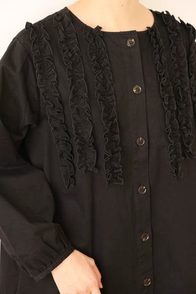 一款能滿足您時尚品味的荷葉邊設計外套。