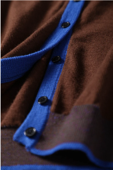 100%羊毛開襟衫，穿上去就營造出明亮的氛圍。