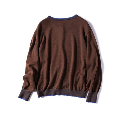 100%羊毛開襟衫，穿上去就營造出明亮的氛圍。