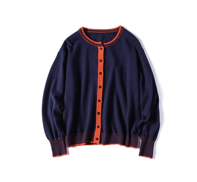 100%羊毛開襟衫，穿上去就營造出明亮的氛圍。