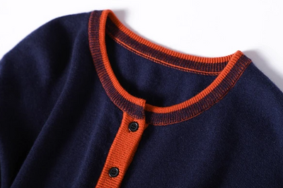 100%羊毛開襟衫，穿上去就營造出明亮的氛圍。