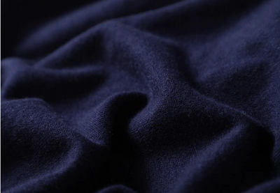 100%羊毛開襟衫，穿上去就營造出明亮的氛圍。